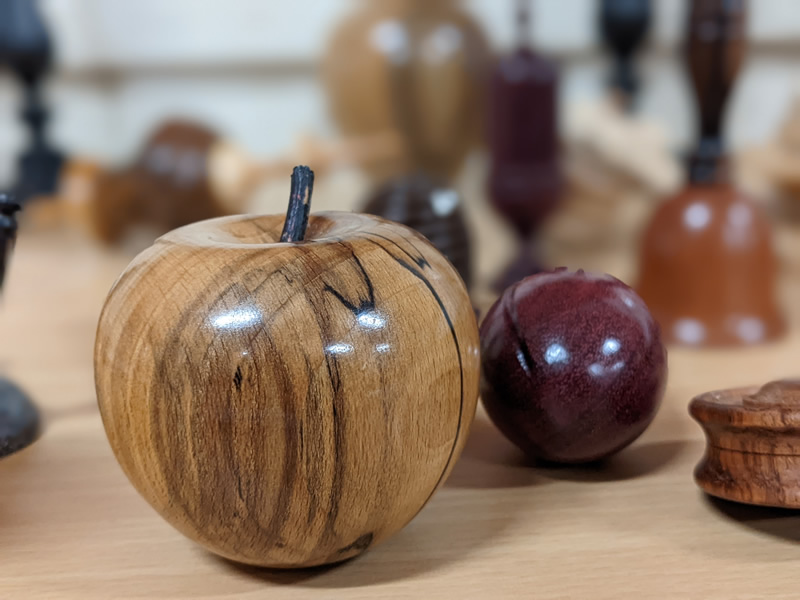 An apple made from spalted beech wood by Gary Rance (club patron). Gary sells apples (among other fineries) from his Etsy page